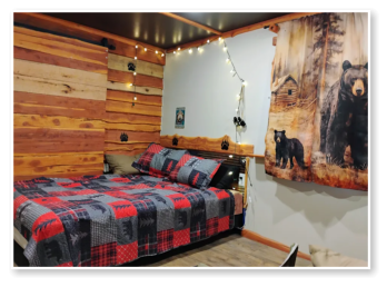 A bedroom in one of our cabins